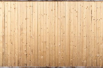 Wooden wall background texture with knots and nails