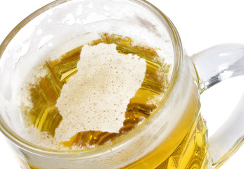 Beer head shaped as Ivory Coast in a beer mug.(series)