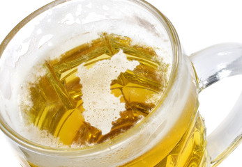 Beer head shaped as Peru in a beer mug.(series)