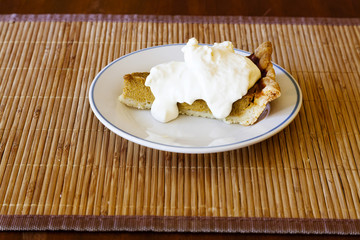 Slice Of Pumpkin Pie With Whipped Cream