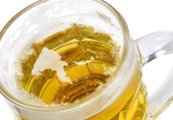 Beer head shaped as Papua New Guinea in a beer mug.(series)