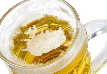 Beer head shaped as Iceland in a beer mug.(series)