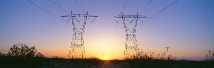 Sunset on electrical transmission towers near Lancaster, California - Powered by Adobe