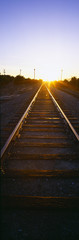 Fototapeta na wymiar Sunrise over railroad tracks near Fillmore, California