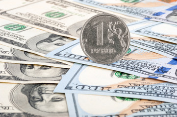 Coin Russian ruble and dollar bills