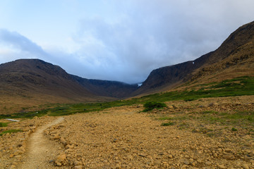 View of the Tablelands and cliffs, Trout River Pond valley in Gros Morne National Park, Newfoundland