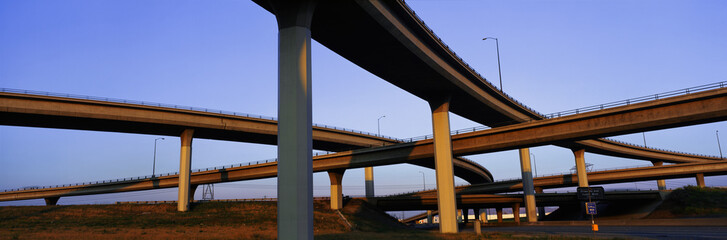 This is a freeway overpass intersection. It is the Interstate 10 & 15 in Southern California. The freeway criss-crosses over itself in several different directions.