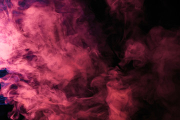 Fototapeta na wymiar Abstract colored smoke hookah on a black background.