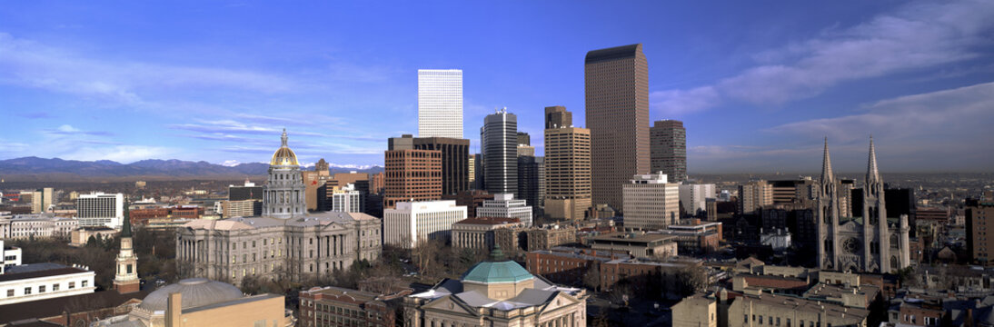 This Is The Skyline, State Capitol And Rocky Mountains. It Shows Morning Light On What Is Known As The Mile High City.