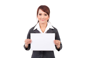 Naklejka premium Happy smiling young business woman holding blank signboard, over white background