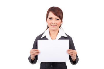 Fototapeta premium Happy smiling young business woman holding blank signboard, over white background