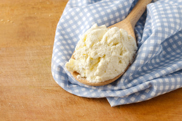 Spoon of cottage cheese