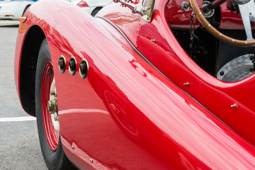 Side Exhaust Pipe Coming Out from Red Vintage Car