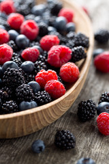 forest berres in a wooden bowl