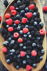 forest berres in a wooden bowl