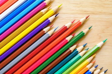Color pencils on wood background