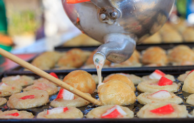 Takoyaki making, Thailand.