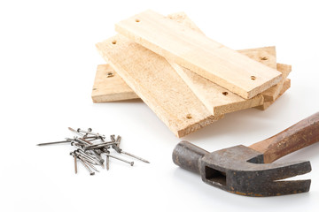 hammer and nail with wood