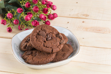 soft dark chocolate brownie cookies on wood