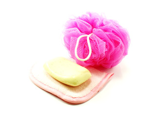 pink towels and bath puff with white soap
