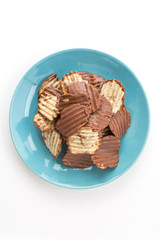 potato chip with chocolate on white