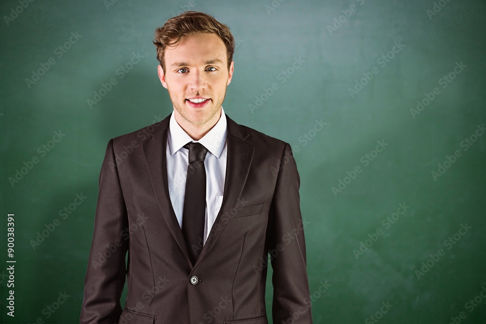 Poster Composite image of young businessman smiling at camera