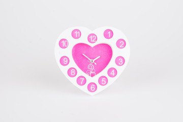 heart shape clock on white background