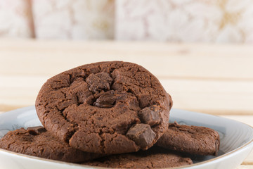 soft dark chocolate brownie cookies on wood