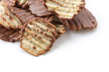 potato chip with chocolate on white