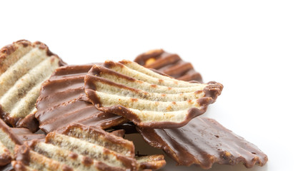 potato chip with chocolate on white
