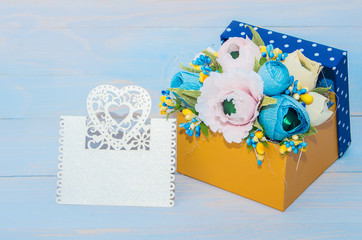 decorative flowers in a gift box
