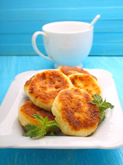 Syrniki (Cottage cheese pancakes, Fritters of cottage cheese) traditional Ukrainian and Russian cuisine.