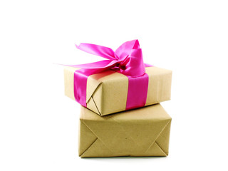 gift box wrapped in recycled paper with ribbon bow