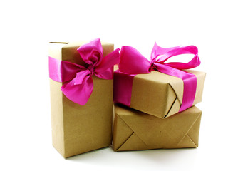 gift box wrapped in recycled paper with ribbon bow