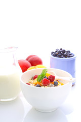 muesli (granola) with berries and yogurt for breakfast