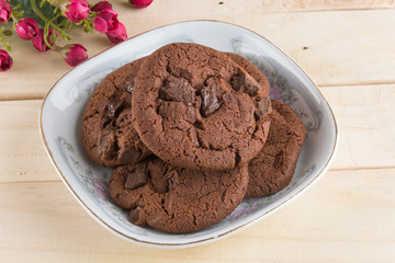 soft dark chocolate brownie cookies on wood