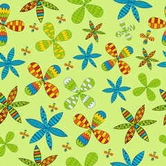 Seamless pattern with flowers on a green background