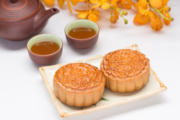 Mooncakes. Traditional Mooncak eand hot tea - Chinese cake