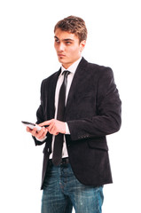 Young happy man holding mobile phone