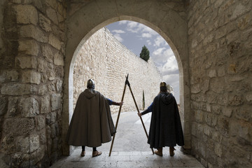 Medieval warriors guarding door
