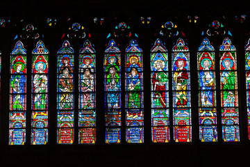 Stained glass windows inside the Notre Dame Cathedral, UNESCO World Heritage Site. Paris, France