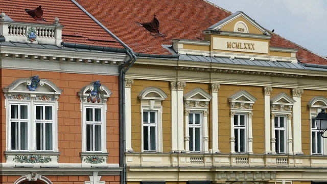 Architectural details at historical buildings in Union Square, Timisoara, Romania.