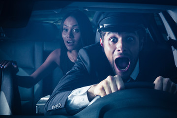 Chauffeur with woman gets into car crash