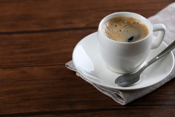 Cup of coffee on table close up