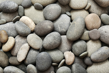 Fototapeta na wymiar Gray sea pebbles background