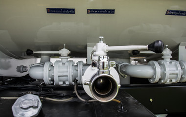 water valves at the rear of a fire engine