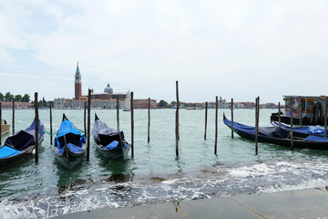 Fototapeta na wymiar Gondolas at the Venetian Canal