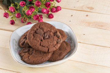 soft dark chocolate brownie cookies on wood