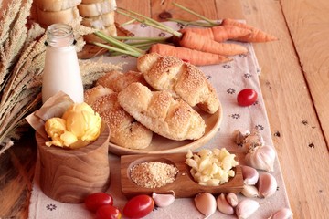 Garlic bread of herb delicious on wood background.