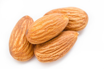 Whole almonds on a white background.
